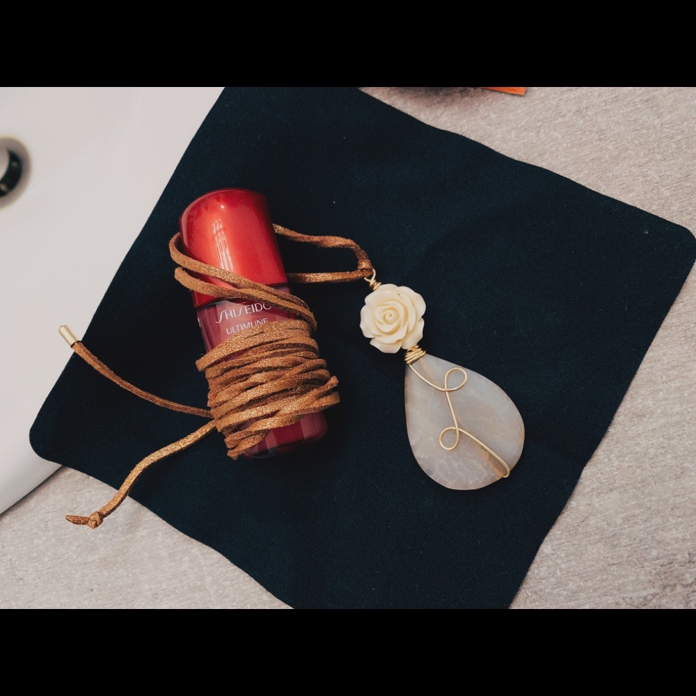 Necklace with leather strap
